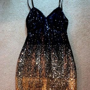 Black and gold sequin dress